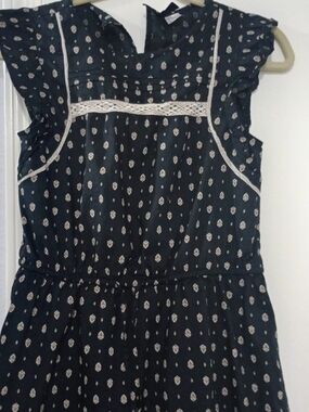 Divided Black Midi Dress with White Print and Lace Trim